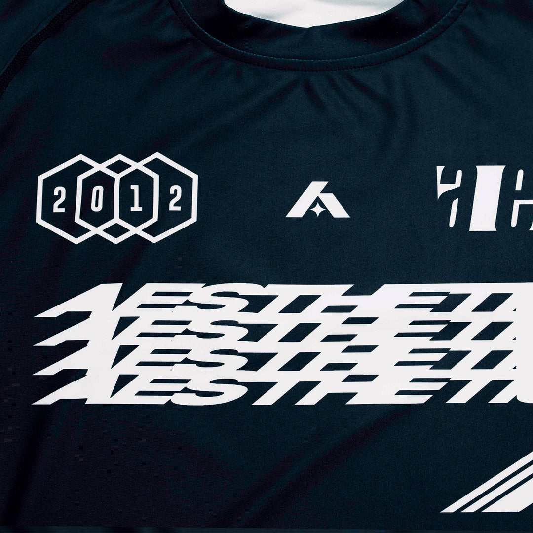 AESTHETIC Axis Short Sleeve Rashguard - Black front close up details - Aesthetic Australia
