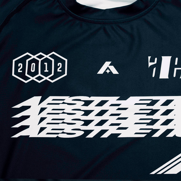 AESTHETIC Axis Short Sleeve Rashguard - Black front close up details - Aesthetic Australia