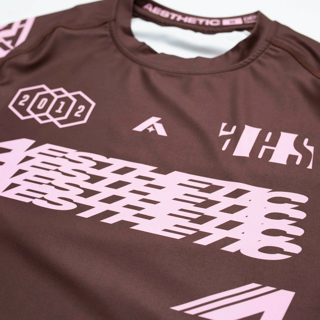 AESTHETIC Axis Short Sleeve Rashguard - Chestnut Brown close up - Aesthetic Australia