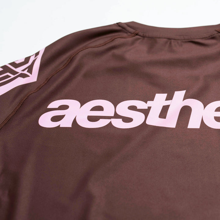 AESTHETIC Axis Short Sleeve Rashguard - Chestnut Brown top details - Aesthetic Australia