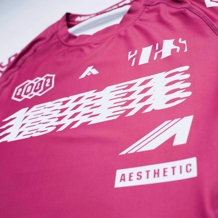 AESTHETIC Axis Short Sleeve Rashguard - Ruby Red front close up - Aesthetic Australia
