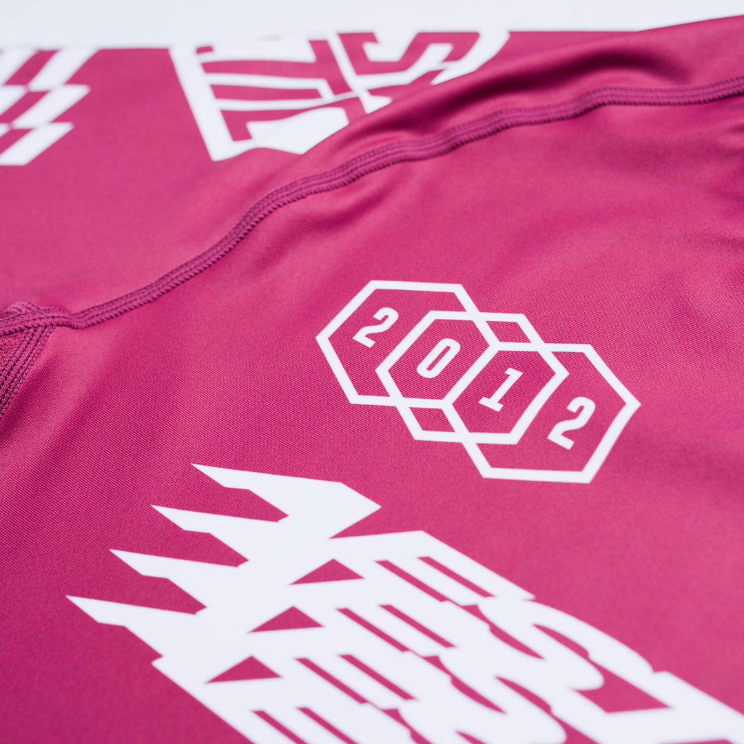 AESTHETIC Axis Short Sleeve Rashguard - Ruby Red side close up - Aesthetic Australia