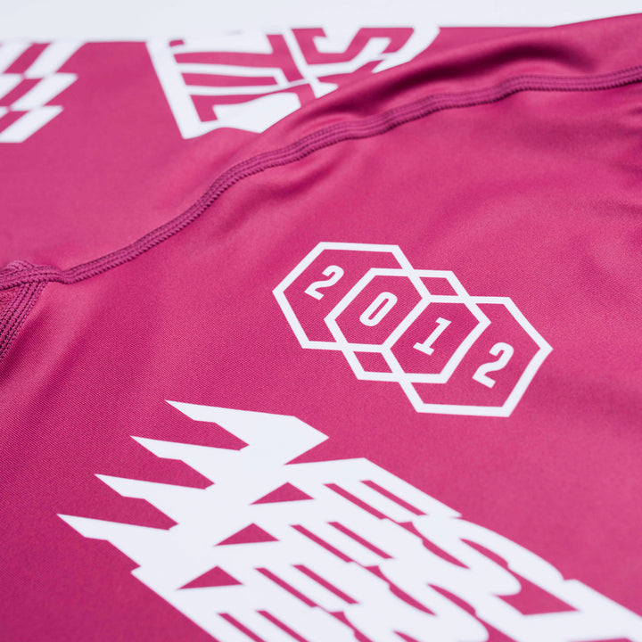 AESTHETIC Axis Short Sleeve Rashguard - Ruby Red side close up - Aesthetic Australia