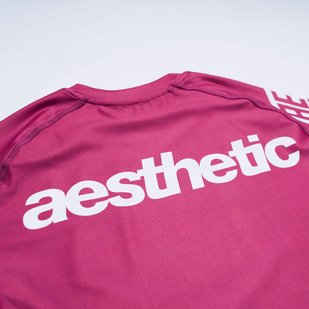 AESTHETIC Axis Short Sleeve Rashguard - Ruby Red back close up details - Aesthetic Australia